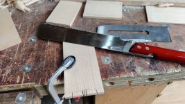 31_sawing_tails.jpg 31_sawing_tails.jpg
